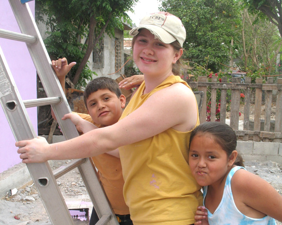 30 - Sarah with two friends on the painting project
