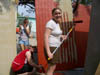 14 - Gabriela's home, painting the siding before it was put up